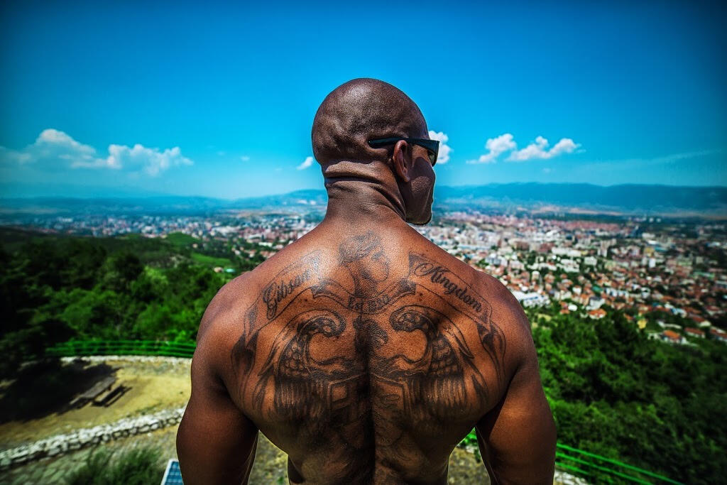 Titus Ambrose Gibson with The Gibson Kingdom tattooed across his back